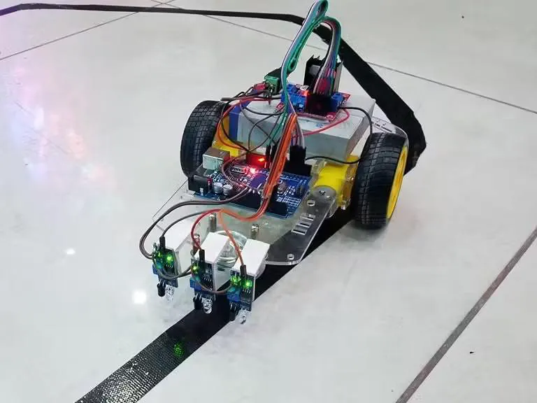 Line-following Arduino robot tracking a black line with its IR sensor array