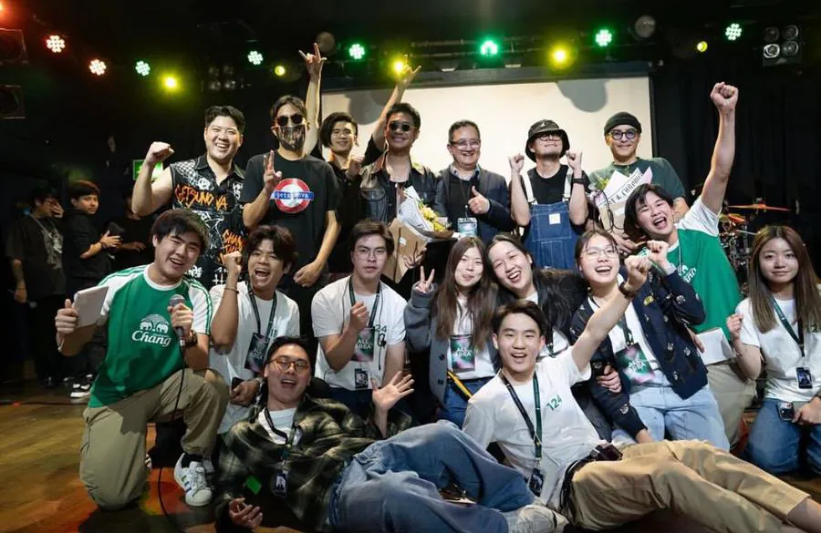 The Samaggi Fest crew and artists celebrating on stage